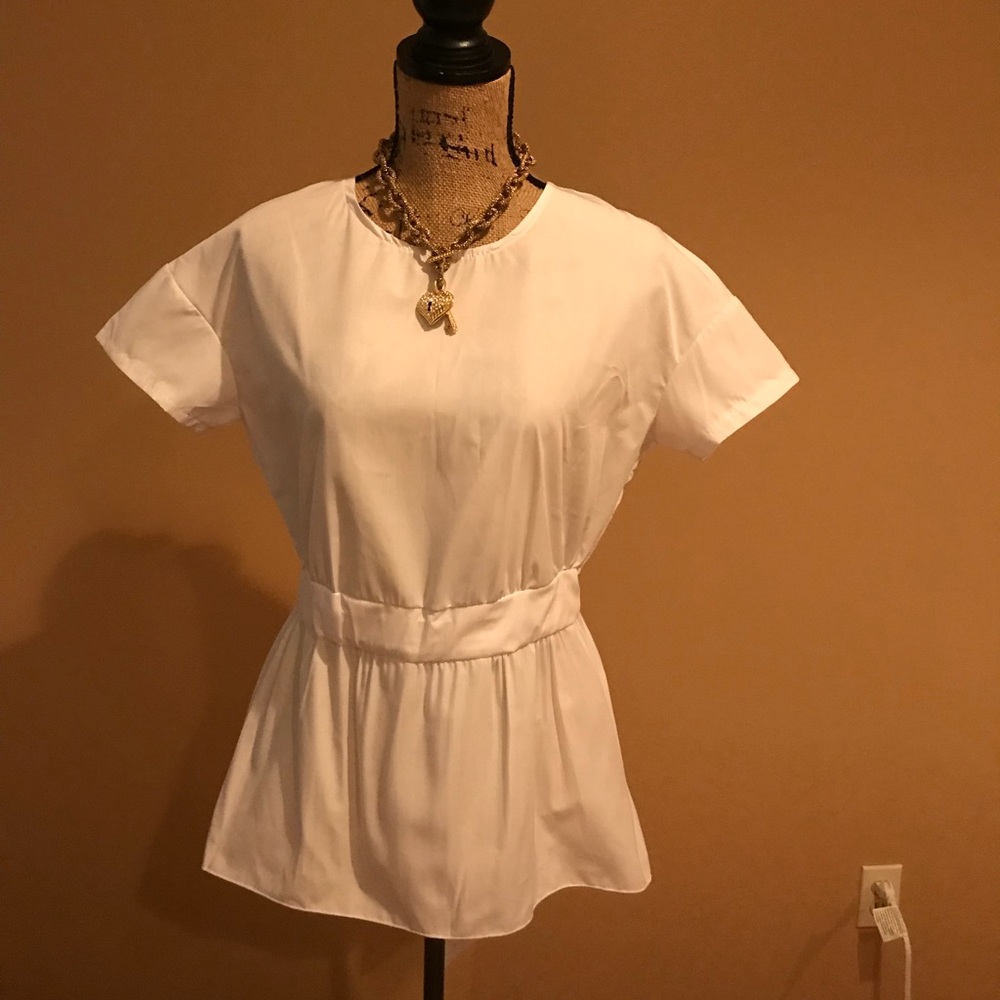 White fashion blouse with open back brand new